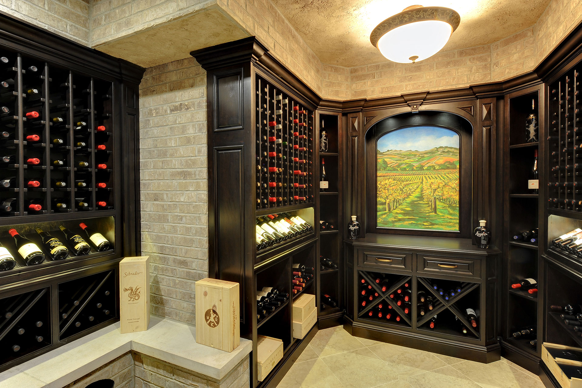 Odessa, TX wine cellar with grand tasting area and custom cabinetry