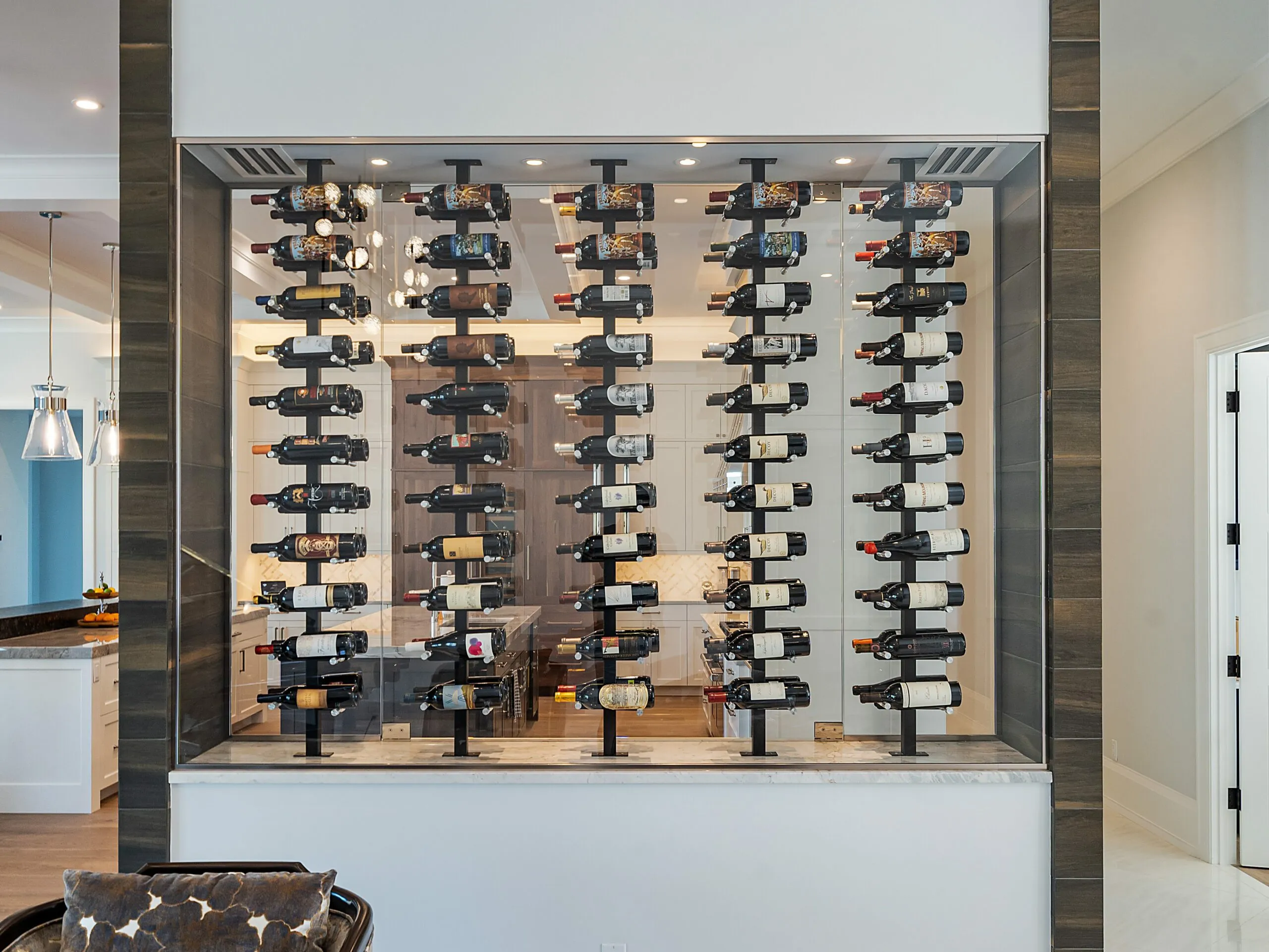 Modern wine wall display with floating metal racks in Midland, TX